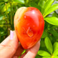Looking for a genuine and stunning Carnelian Crystal Heart? Shop at Magic Crystals for Carnelian Heart - Orange Heart - Crystal Stone Heart. Extra-High Quality Carnelian Hearts. We only carry 'AAA' Quality Carnelian from Madagascar. Red Agate Crystal for Reiki Healing. Red Carnelian, Orange Carnelian, Authentic Crystal. Carnelian-Heart-O