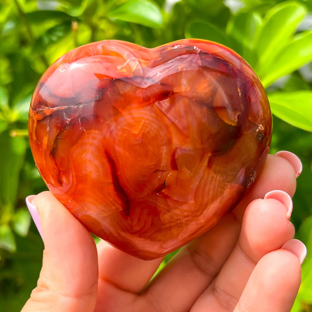 Looking for a genuine and stunning Carnelian Crystal Heart? Shop at Magic Crystals for Carnelian Heart - Orange Heart - Crystal Stone Heart. Extra-High Quality Carnelian Hearts. We only carry 'AAA' Quality Carnelian from Madagascar. Red Agate Crystal for Reiki Healing. Red Carnelian, Orange Carnelian, Authentic Crystal. Carnelian-Heart-R