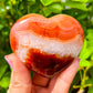 Looking for a genuine and stunning Carnelian Crystal Heart? Shop at Magic Crystals for Carnelian Heart - Orange Heart - Crystal Stone Heart. Extra-High Quality Carnelian Hearts. We only carry 'AAA' Quality Carnelian from Madagascar. Red Agate Crystal for Reiki Healing. Red Carnelian, Orange Carnelian, Authentic Crystal. Carnelian-Heart-I