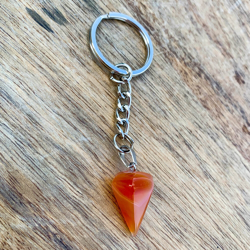 Carnelian Keychain. Carnelian is one of the most powerful crystals for vitality and motivation. Carnelian Single Point Keychain - Crystal keychain at Magic Crystals. Free shipping available. We carry a wide variety of keychains, gemstones, bracelets, earrings, and handmade jewelry. Carnelian gemstones.