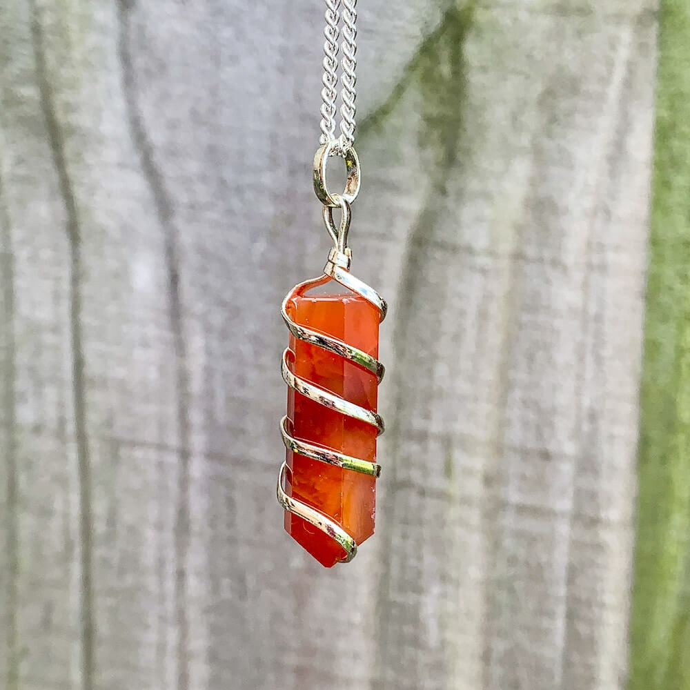 Buy Orange Carnelian Necklace - Carnelian Gemstone Jewelry, Natural Carnelian Gemstone Single-Terminated Gemstone Points wrapped at Magic Crystals. Shop for carnelian jewelry with FREE SHIPPING AVAILABLE. Carnelian is best for Motivation. Spiral Wire Wrapped necklace. Wire-wrapped Carnelian Stone Necklace.