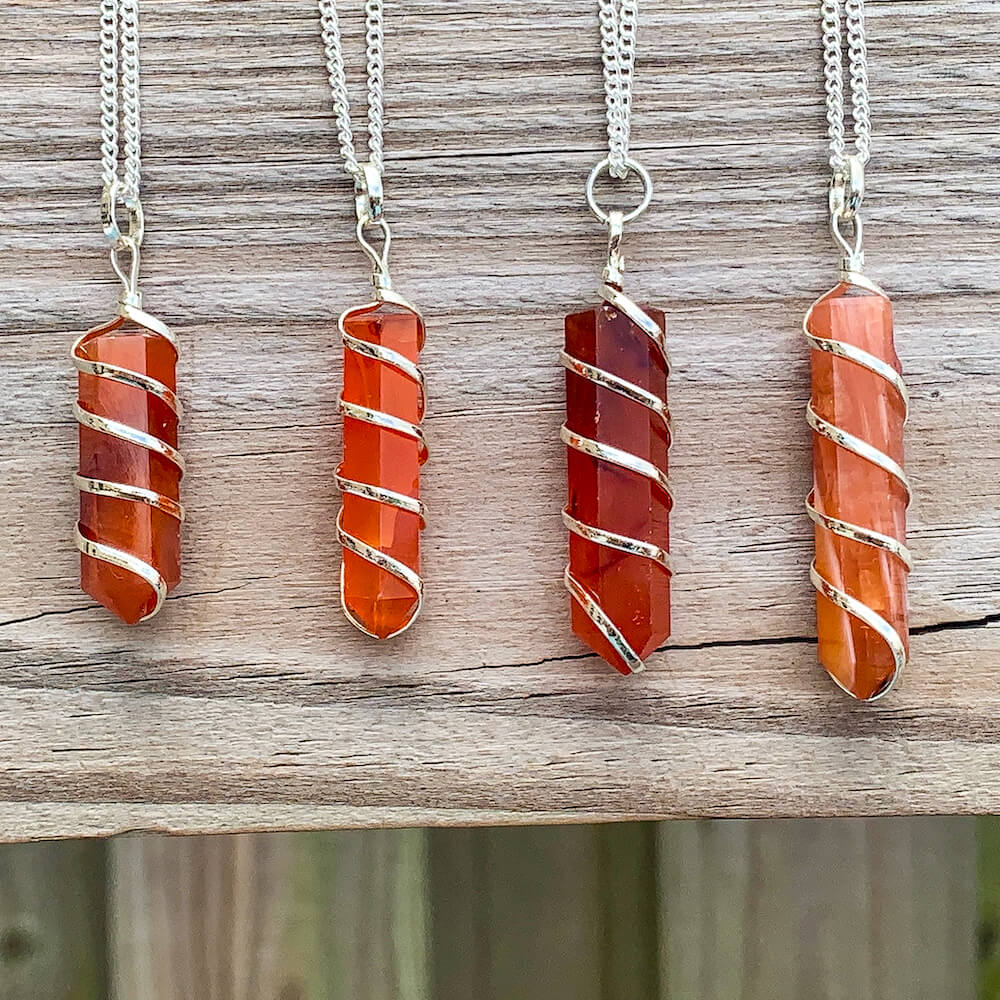 Buy Orange Carnelian Necklace - Carnelian Gemstone Jewelry, Natural Carnelian Gemstone Single-Terminated Gemstone Points wrapped at Magic Crystals. Shop for carnelian jewelry with FREE SHIPPING AVAILABLE. Carnelian is best for Motivation. Spiral Wire Wrapped necklace. Wire-wrapped Carnelian Stone Necklace.