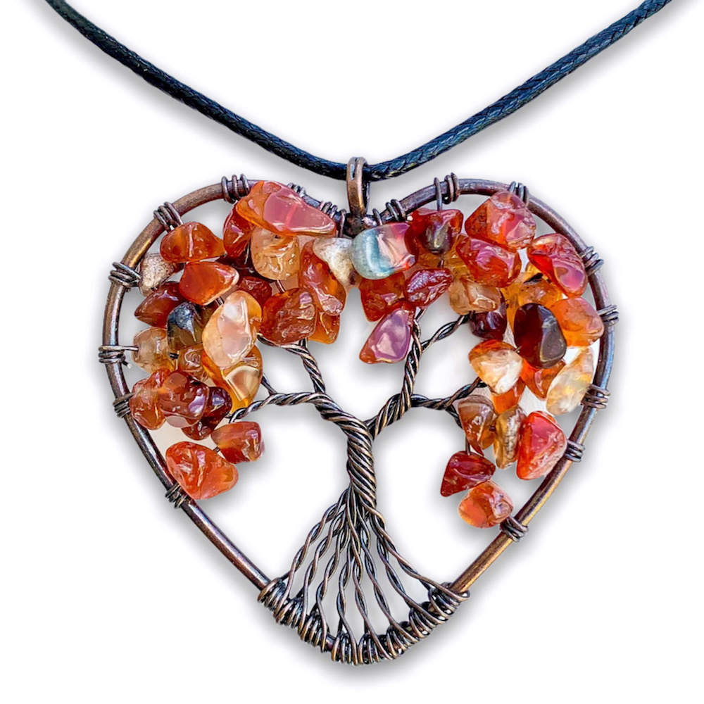 Carnelian -Tree-of-Life-Copper-Wire-Heart-Necklace. Looking for Copper Jewelry? Magic Crystals offers handmade Heart Copper Wire Wrapped,  Tree Of Life,  Hematite Pendant Necklace, 7th Anniversary Gift, Yggdrasil Necklace for Him or Her Gift. Heart Gift perfect for any occasion. Heart Necklace With gemstones. Tree of Life made of copper in a pendant necklace.