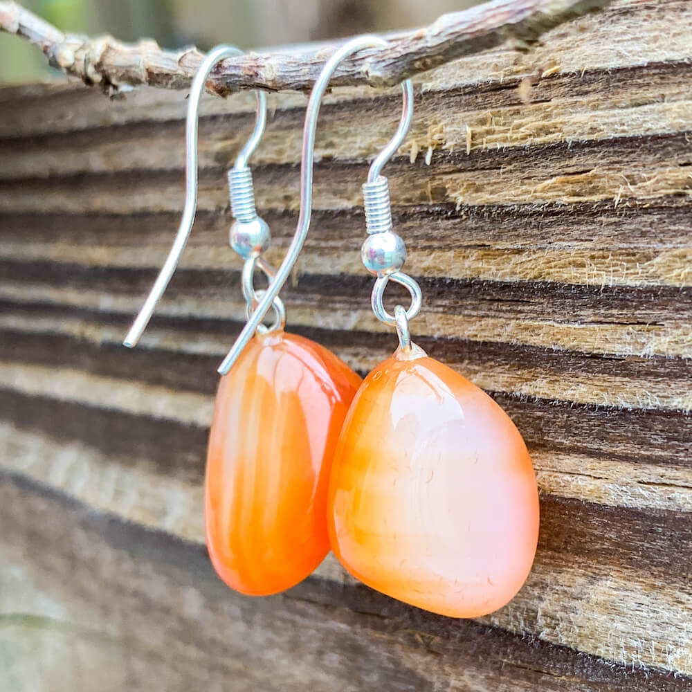 Looking for Carnelian Earrings? Carnelian Gemstone Jewelry, Natural Carnelian Gemstone Single-Terminated Gemstone stone polished at Magic Crystals. Carnelian Jewelry: FREE SHIPPING AVAILABLE. Carnelian is best for healing. Tumbled earring. Wire-wrapped Carnelian Stone dangle earrings. ORANGE earrings.