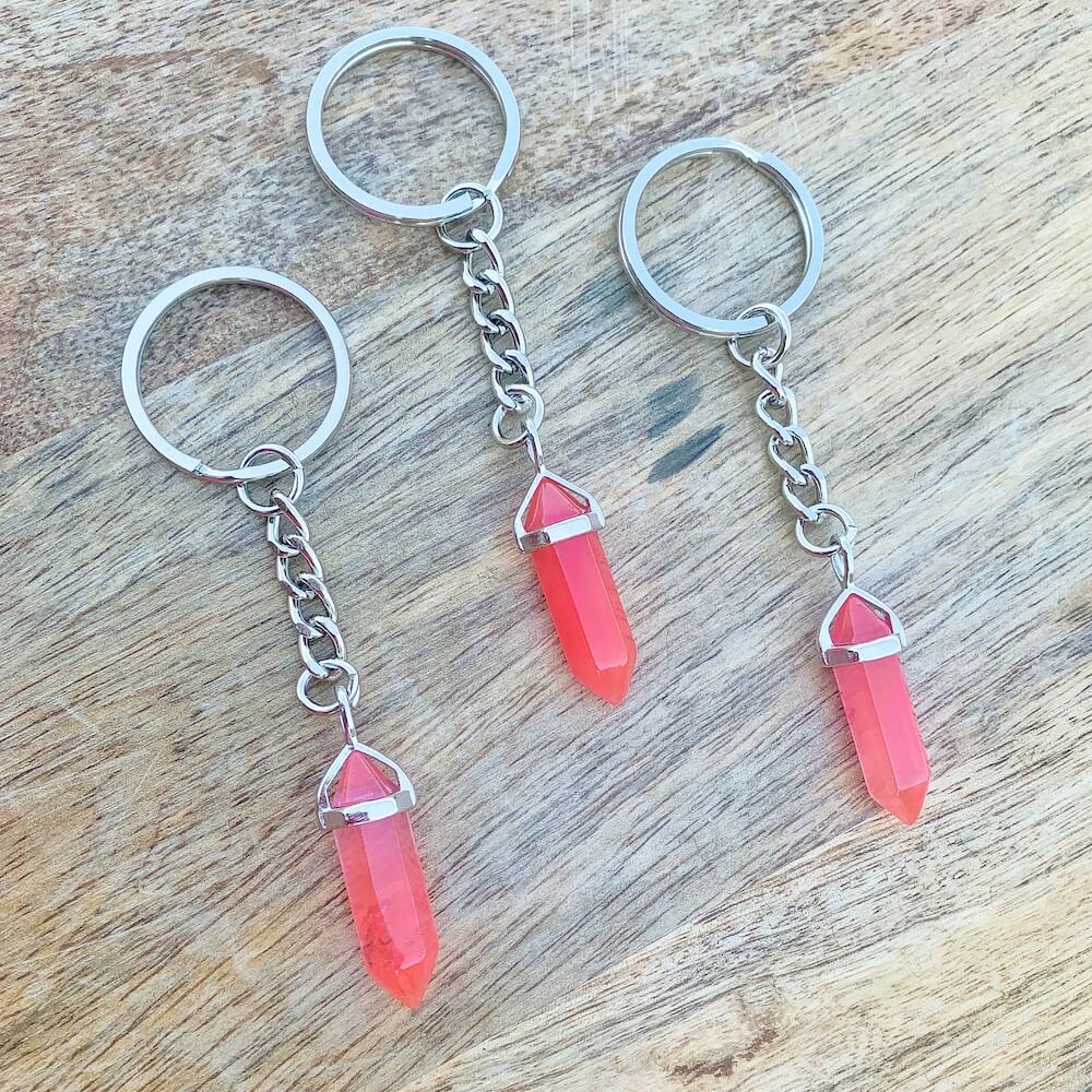 Cherry Quartz KEYCHAIN. Shop at Magic Crystals for Crystal Keychain, Pet Collar Charm, Bag Accessory, natural stone, crystal on the go, keychain charm, gift for her and him. FREE SHIPPING available. Cherry Quartz Crystal Key Chain, Crystal Keyring, Cherry Quartz Crystal Key Holder.