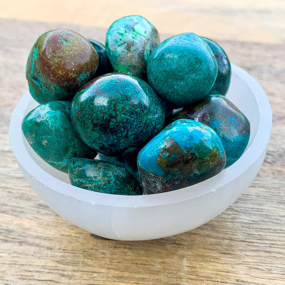 Check out Magic Crystals for the very best in unique, Chrysocolla Tumbled chrysocolla, chrysocolla healing stones, chrysocolla, polished chrysocolla, chrysocolla tumbles at Magic Crystals. Buy genuine Chrysocolla gemstone stones and crystals with FREE SHIPPING available. Chrysocolla meaning: calmness and communication.