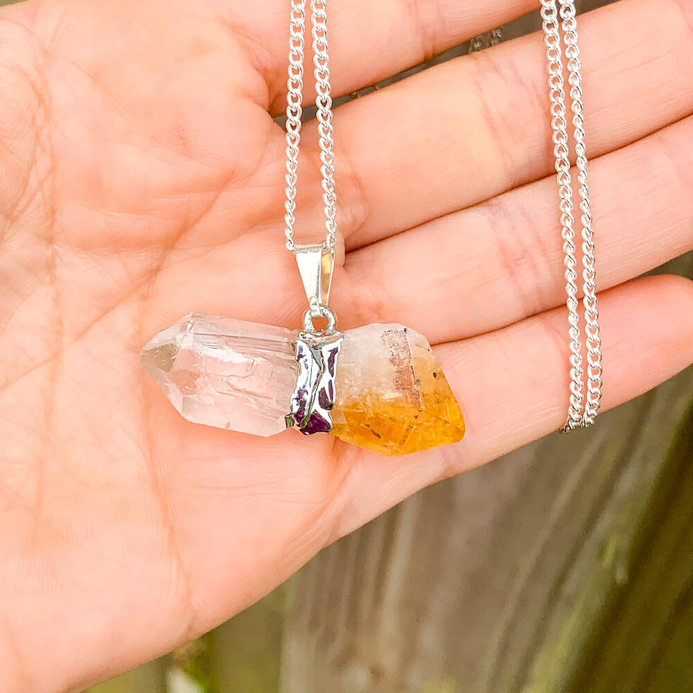 Raw Citrine and Clear Quartz Pendant Crystal Necklace. Abundance amplifier necklace. Looking for citrine necklaces? Citrine Jewelry?  Find quality citrine gemstone when you shop at Magic Crystals. Citrine is a solar plexus chakra stone used metaphysically to increase, magnify and clarify personal power and energy