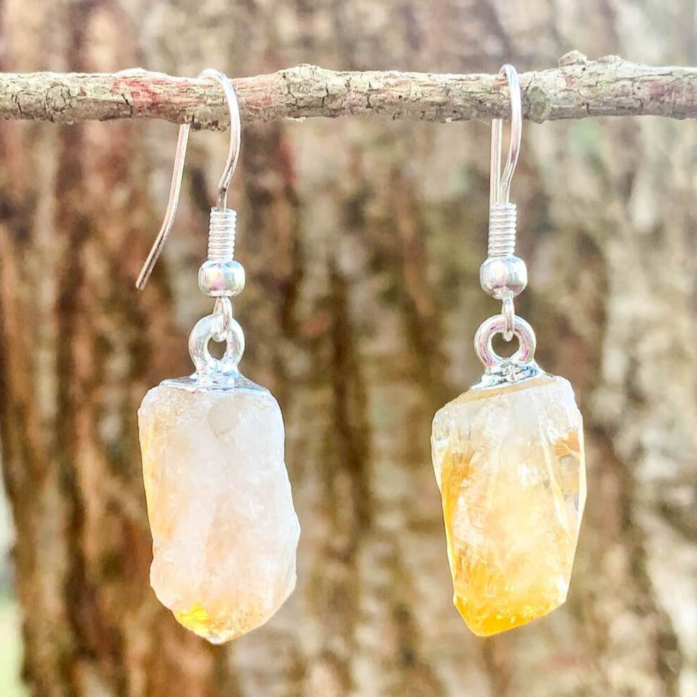 Check out our CITRINE Earrings - Birthstone, Raw Stone Jewelry, Dangle Earrings, Healing Crystals, Silver Earrings when you shop at Magic Crystals. What is Citrine? Citrine is a mineral, member of the Quartz family. Citrine Crystal meaning is ABUNDANCE and MOTIVATION. Citrine stone benefits and more.