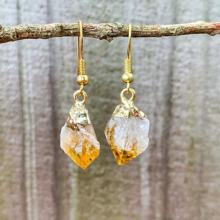 Check out our CITRINE Earrings - Birthstone, Raw Stone Jewelry, Dangle Earrings, Healing Crystals, Golden Earrings when you shop at Magic Crystals. What is Citrine? Citrine is a mineral, member of the Quartz family. Citrine Crystal meaning is ABUNDANCE and MOTIVATION. Citrine stone benefits and more.