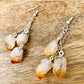 Check out our CITRINE Earrings - Birthstone, Raw Stone Jewelry, Dangle Earrings, Healing Crystals, Silver Earrings when you shop at Magic Crystals. What is Citrine? Citrine is a mineral, a member of the Quartz family. Citrine Crystal meaning is ABUNDANCE. Citrine stone benefits and more. FREE SHIPPING available.
