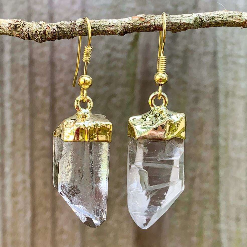 Looking for clear quartz jewelry? Well look no further! Shop at Magic Crystals for the best clear quartz quality available. We carry a wide variety of clear Clear Quartz Earrings, Raw Jewelry, Dangle Earrings with FREE SHIPPING available. Check out magiccrystals.com