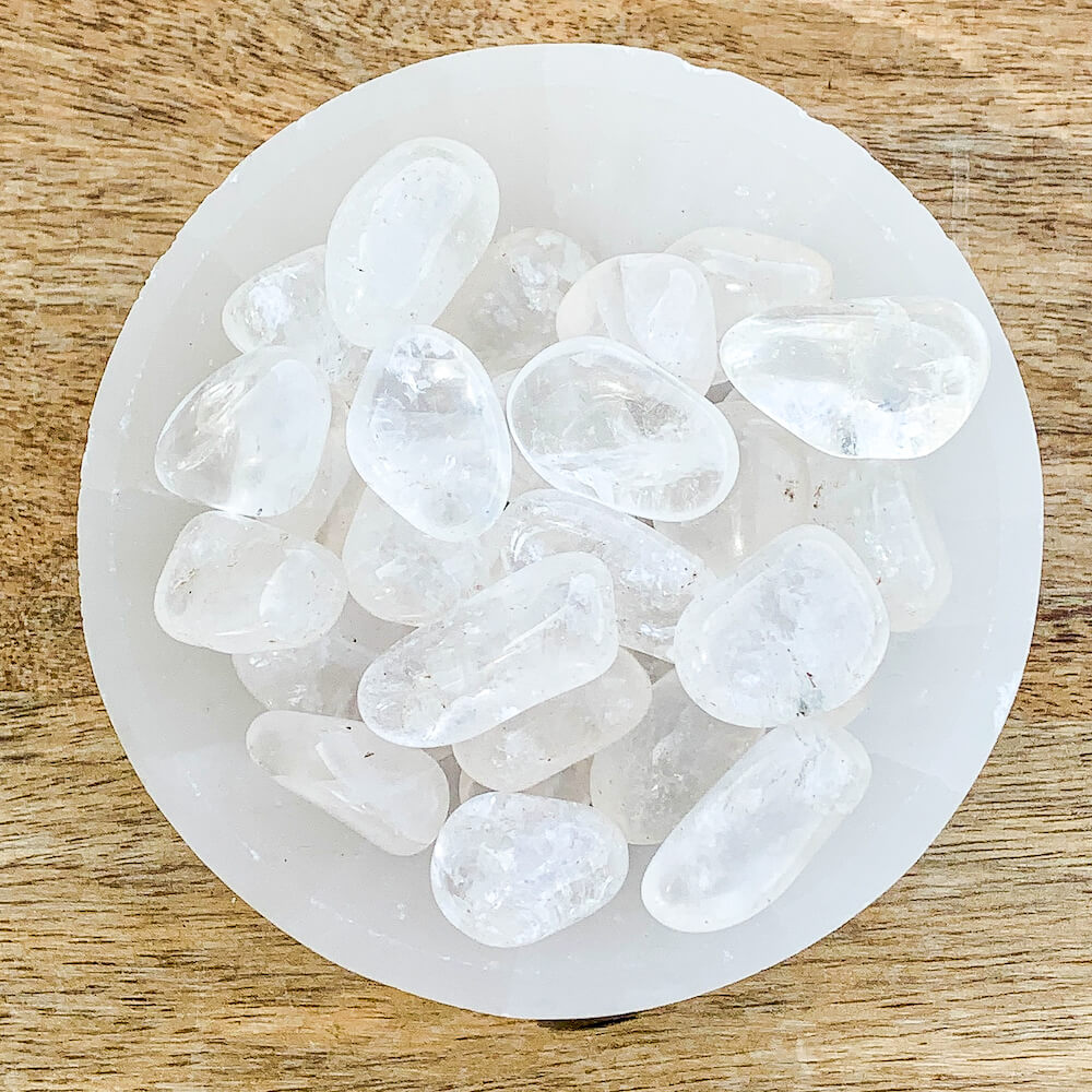 Looking for Tumbled Clear Quartz Stone - Healing Crystal? Shop at Magic Crystals. Quartz Tumbled Stones are used to cleanse, focus, and amplify energy levels in the body. Clear Quartz protects against negativity, attunes to your higher self, relieves pain, and has been shown to enhance as well as strengthen the aura.