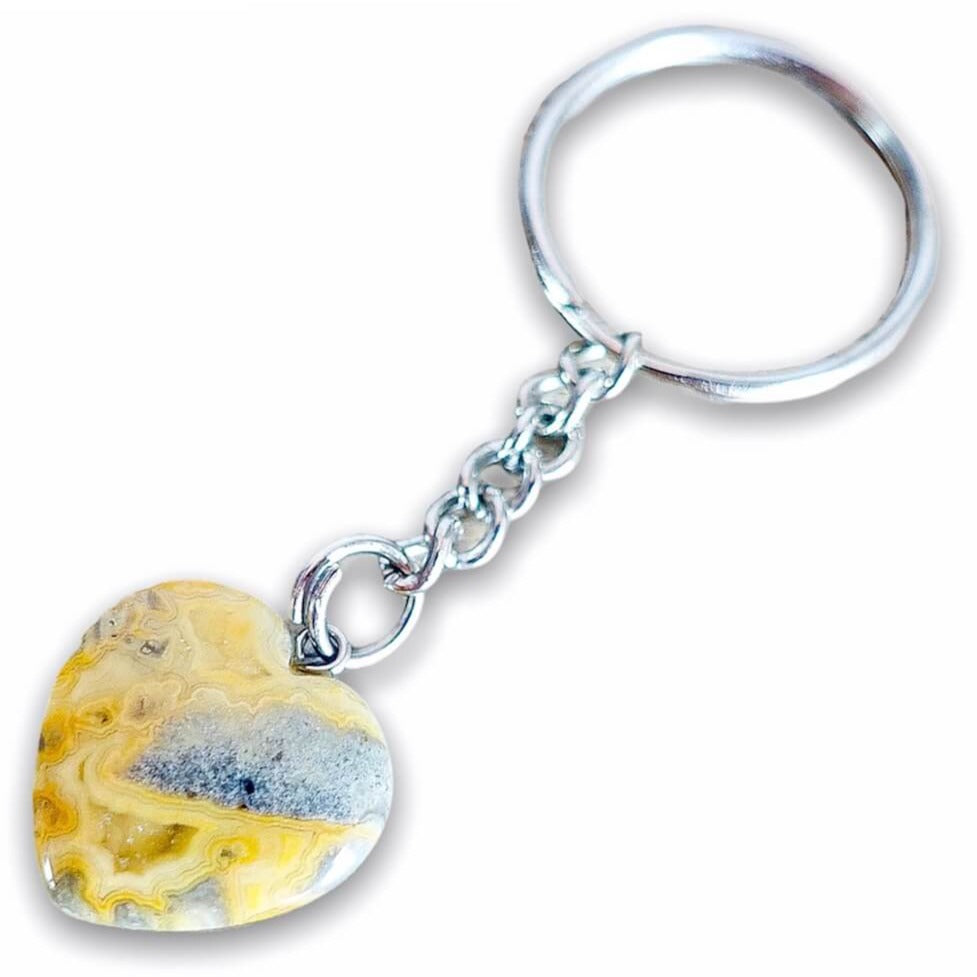 Crazy Lace Agate Keychain. Crazy Lace Agate crystal is associated with happiness. It is a wonderful source of positive, subtle energy that can be harnessed by everyone. Crazy Lace Agate Heart Keychain - Crystal Keychain at Magic Crystals. Shop with free shipping available. We carry a wide variety of cat eyes keychains, gemstones, bracelets, earrings and handmade jewelry. 