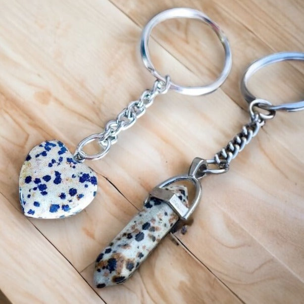 Dalmatian Jasper keychain. Shop at Magic Crystals for Crystal Keychain, Pet Collar Charm, Bag Accessory, natural stone, crystal on the go, keychain charm, gift for her and him. RDalmatian Jasper is a great strength. Dalmatian Jasper Natural Stone Keychain, Crystal Keychain, Dalmatian Jasper Crystal Key Holder. 