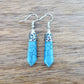 Gemstone Dangling Earrings. Dark Blue Turquoise Dangle-Earrings. Looking Natural Stone Earrings - Dangling Crystal Jewelry? Show Jewelry at Magic Crystals. Natural stone, dangle earrings, and more. Crystal Single Point Earrings, Small Crystal Points, Healing Crystal Earrings, Gemstones, and more. FREE SHIPPING available.