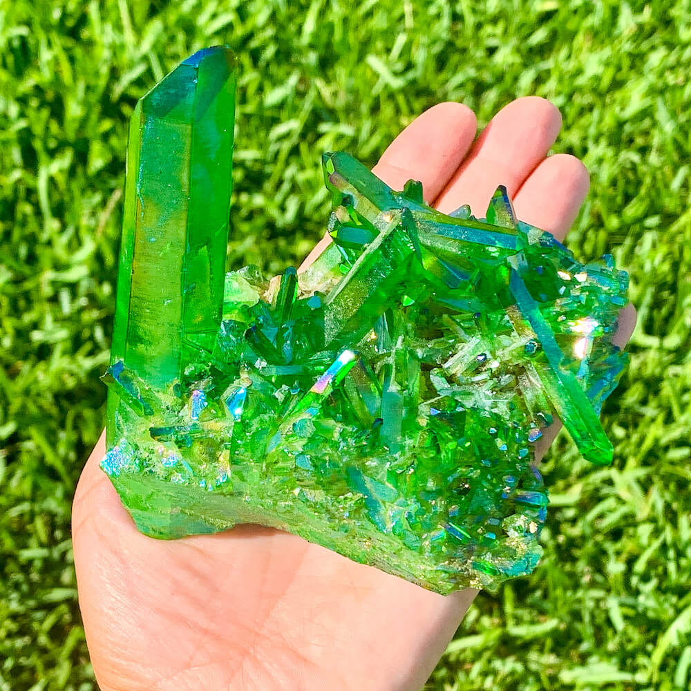 Looking for Rare Beautiful Dark Deep Green Aura Quartz cluster? Show at Magic Crystals for green gemstone clusters. AURA QUARTZ in color Dark Deep Green Aura Quartz. Crystal Cluster and spirit Quartz, Metaphysical perfect for Crystal Decor. FREE SHIPPING AVAILABLE