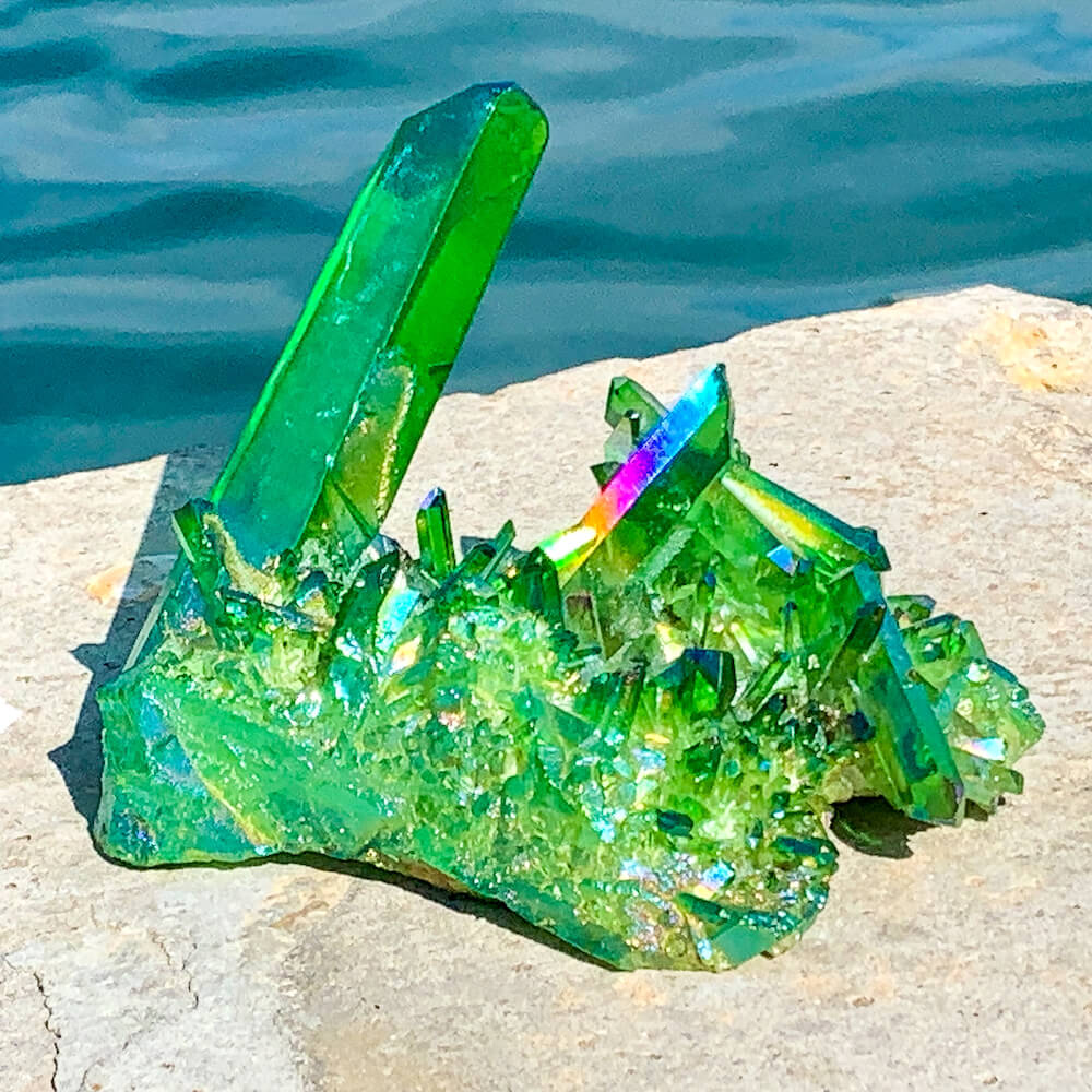 Looking for Rare Beautiful Dark Deep Green Aura Quartz cluster? Show at Magic Crystals for green gemstone clusters. AURA QUARTZ in color Dark Deep Green Aura Quartz. Crystal Cluster and spirit Quartz, Metaphysical perfect for Crystal Decor. FREE SHIPPING AVAILABLE