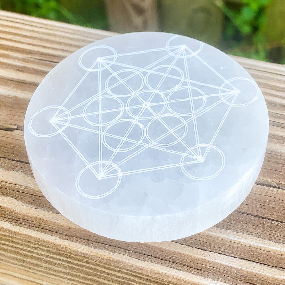 Looking for Engraved Selenite Metraton Cube Charging Plate with Free Shipping? Shop at Magic Crystals for Selenite Flower of Life Ritual plates, Polished Selenite Charging station. Large Heavy Crystal Plate used for Protection Cleansing Meditation Crystal Healing Chakra, Selenite Alter,Selenite Flat Crystal Plate.