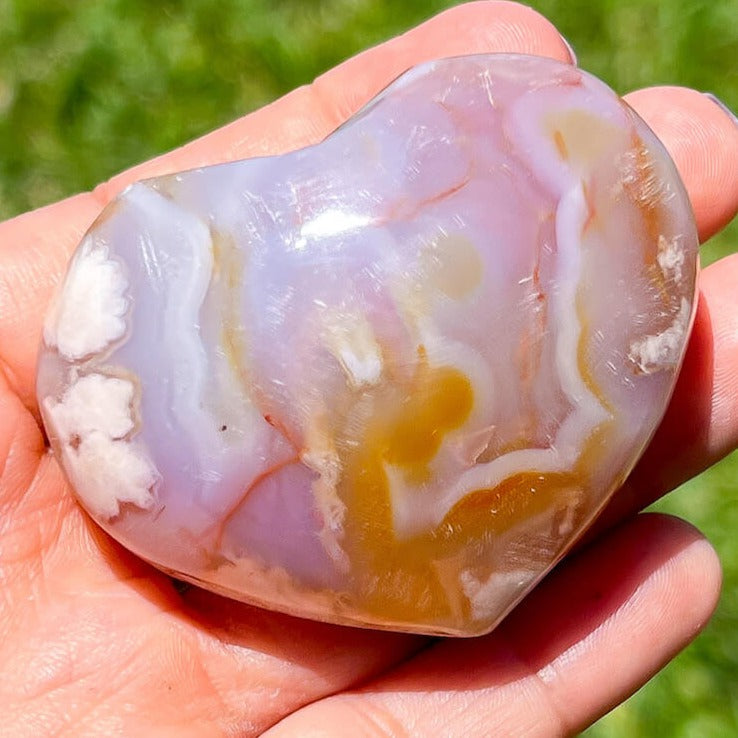 Looking for Flower Agate heart/ Flower agate heart carving/ Agate flower carving/ Cherry Blossom Agate carving? shop at Magic Crystals for Flower Agate heart with FREE SHIPPING available. Flower agate can be used to re-bloom the feminine side of all persons. GEMSTONE heart carving. High quality crystals.