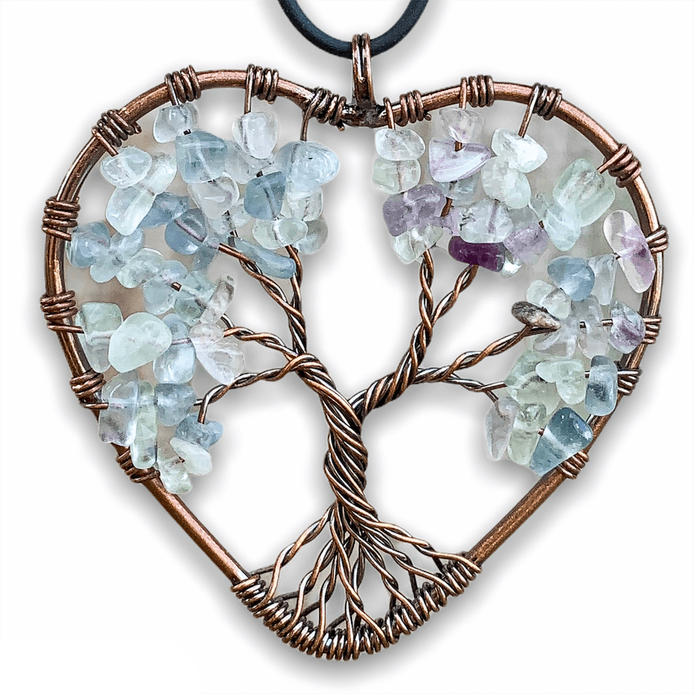 Fluorite-Tree-of-Life-Copper-Wire-Heart-Necklace. Looking for Copper Jewelry? Magic Crystals offers handmade Heart Copper Wire Wrapped,  Tree Of Life,  Hematite Pendant Necklace, 7th Anniversary Gift, Yggdrasil Necklace for Him or Her Gift. Heart Gift perfect for any occasion. Heart Necklace With gemstones. Tree of Life made of copper in a pendant necklace.