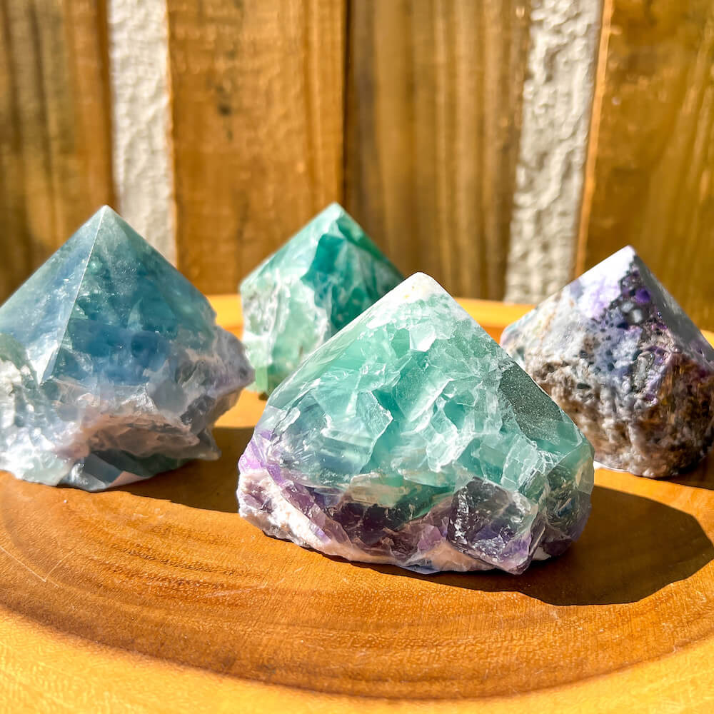 Fluorite-Power-Point. Looking for a Polished Point - Stone Points - Crystal Points - Power Point - Crystal Point Large - Crystal Point Tower - Stone Point? MagicCrystals.com has a wide variety of crystal points to power you grid!. These are used as an Alter Crystal Tower.  Magic Crystals offers free shipping! Crystal Grid Point