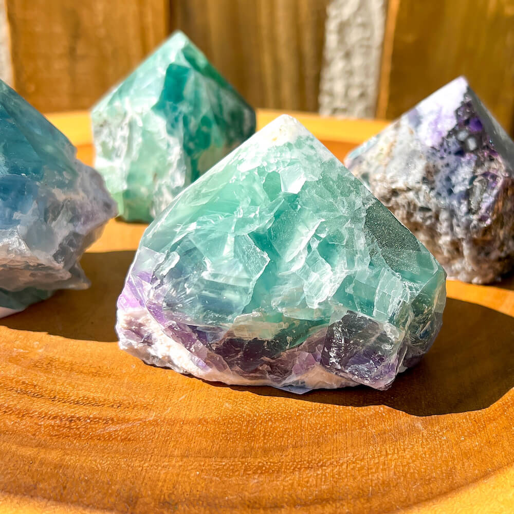 Fluorite-Power-Point. Looking for a Polished Point - Stone Points - Crystal Points - Power Point - Crystal Point Large - Crystal Point Tower - Stone Point? MagicCrystals.com has a wide variety of crystal points to power you grid!. These are used as an Alter Crystal Tower.  Magic Crystals offers free shipping! Crystal Grid Point