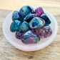 Looking for Fluorite Tumbled Stones? Shop at Magic Crystals for Rainbow Fluorite Tumbled Stone -Rainbow Fluorite Stone - Pocket Stone - Metaphysical Reiki Healing with FREE SHIPPING available. Natural Fluorite Gemstone for INTUITION, PROTECTION, INTELLECT. Magiccrystals.com offers the best quality gemstones.