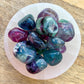 Looking for Fluorite Tumbled Stones? Shop at Magic Crystals for Rainbow Fluorite Tumbled Stone -Rainbow Fluorite Stone - Pocket Stone - Metaphysical Reiki Healing with FREE SHIPPING available. Natural Fluorite Gemstone for INTUITION, PROTECTION, INTELLECT. Magiccrystals.com offers the best quality gemstones.