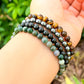 The Gemini Bracelet Zodiac Set from Magic Crystals is perfect and designed for people whose sun sign is Gemini to stay Confident, lively, and sociable. It blends Moss Agate, Hematite, Tiger Eye, and Black Obsidian. Best Gemini crystals and Gemini Zodiac Pack gift for birthdays, Christmas, mother's day