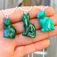 Malachite Cat Pendant Necklace - Malachite Jewelry at Magic Crystals. Malachite stimulates the heart chakra. Makes a perfect Valentine's day gift or Christmas Present. Malachite is ideal for burning through the fog of emotional confusion. Heart chakra stones - heart chakra crystals - malachite jewelry