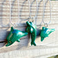 Malachite Dolphin Pendant Necklace - Malachite Jewelry at Magic Crystals. Malachite stimulates the heart chakra. Makes a perfect Valentine's day gift or Christmas Present. Malachite is ideal for burning through the fog of emotional confusion. Heart chakra stones - heart chakra crystals - malachite jewelry