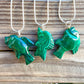 Malachite Fish Pendant Necklace - Malachite Jewelry at Magic Crystals. Malachite stimulates the heart chakra. Makes a perfect Valentine's day gift or Christmas Present. Malachite is ideal for burning through the fog of emotional confusion. Heart chakra stones - heart chakra crystals - malachite jewelry