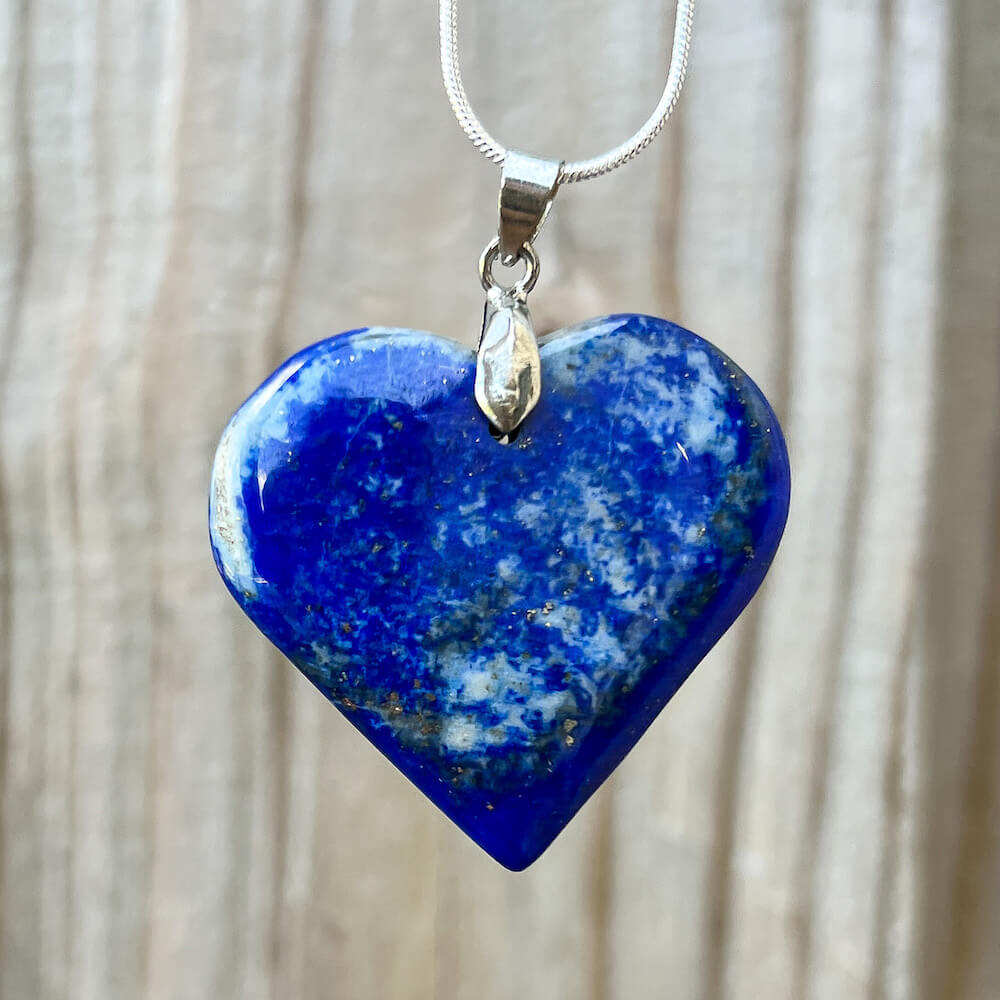 Check out our Lapis Lazuli Heart Necklace - Lapis Lazuli Jewelry from Afghanistan for the very best in unique, handmade pieces from Magic Crystals. Lapis Lazuli heart necklace, Throat & Third Eye Chakra healing Lapis Lazuli pendant, Healing Crystal Lapis Lazuli Jewelry, Natural stones necklace, Crystal Necklace. 