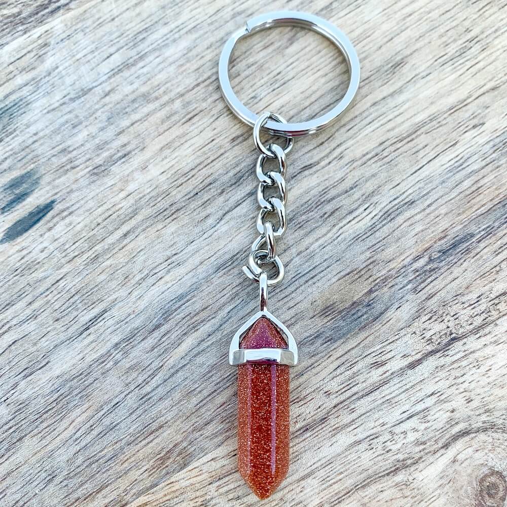 GoldStone KEYCHAIN. Shop at Magic Crystals for Crystal Keychain, Pet Collar Charm, Bag Accessory, natural stone, crystal on the go, keychain charm, gift for her and him. GoldStone is a great SPIRITUALITY. FREE SHIPPING available. GoldStone Crystal Key Chain, Crystal Keyring, GoldStone Crystal Key Holder