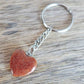 Goldstone Stone Heart Keychain. Shop at Magic Crystals for Crystal Keychain, Pet Collar Charm, Bag Accessory, natural stone, crystal on the go, keychain charm, gift for her and him. GoldStone is a great SPIRITUALITY. FREE SHIPPING available. GoldStone Crystal Key Chain, Crystal Keyring, GoldStone Crystal Key Holder