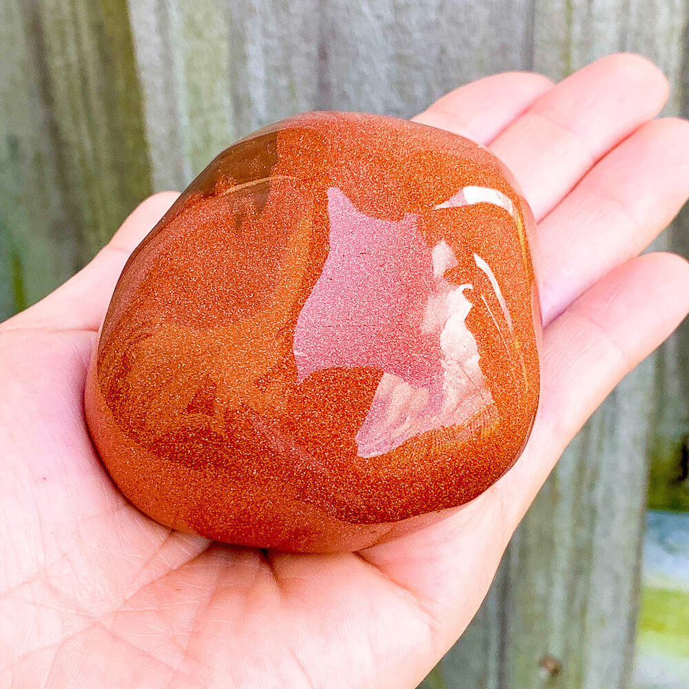 Looking for extra Large Tumbled Goldstone Stone - Large Palm Stone shop at MAGIC CRYSTALS. Goldstone is known as a protective warrior stone. It helps you get out of your head and back down to earth. Increases drive and confidence. Goldstone promotes vitality.