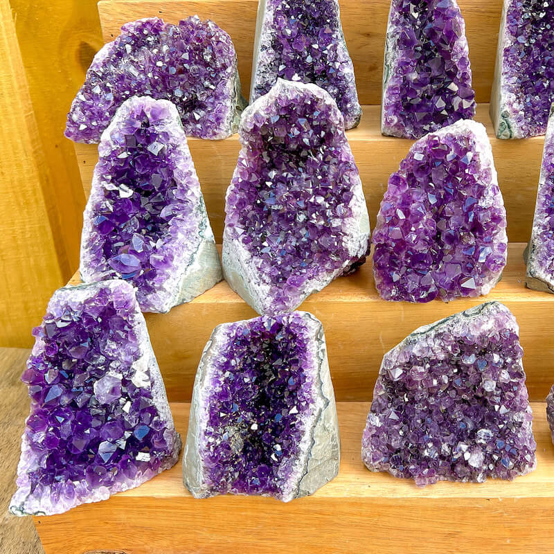 Shop at Magic Crystals for Grade A Amethyst Cut Base Geode - Cathedral Amethyst. High Quality, deep purple world’s Highest Quality Amethyst Geode, Crystals and Stones, Healing stones. Top Rated Mineral Dealer. Authenticity Certificates. Deep & Rich Hues. Amethyst from Brazil and Uruguay available.