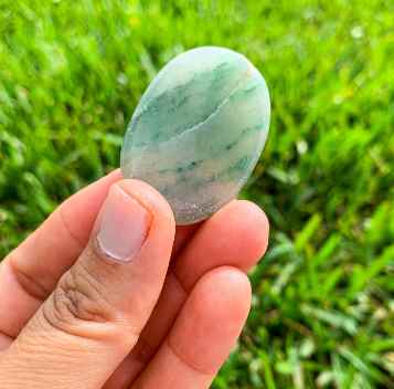Jade Palm Stone Gemstone-Magic Crystals. Looking for natural green kade palm stone? Shop at magiccrystals.com . Magic Crystals carries Jade Palmstones - Meditation Stones - Green Jade Palm Stones with FREE SHIPPING AVAILABLE. Empathetic, supporting and glowing with soft, pretty color, this Jade palm stone is a wonderful crystal gift for someone you love.