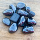 Buy Hematite Tumbled Stones, Hematite Polished Gemstones, Bulk Crystals at Magic Crystals. Tumbled Hematite, Hematite Crystal, Polished Hematite. Hematite helps to absorb negative energy. Hematite is also good for working with the Root Chakra.