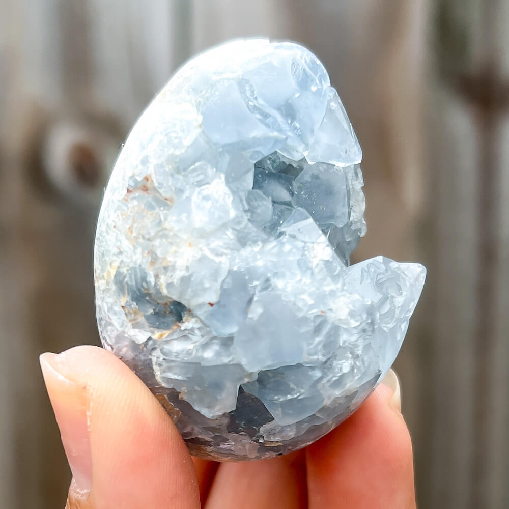 Looking for Celestite Stone Egg - Celestite Raw Crystal Cluster? Magic Crystals carries genuine Celestite from Madagascar. Natural, pale icy blue celestite. Large Celestite Crystal Geode | Celestite Crystal on a stand | Madagascar Celestite | Celestite Crystal Cluster | Celestite Crystal.
