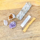 Looking for a cleansing kit to bless your home? Shop at Magic Crystals Bundle for Home Blessings Set! Cleansing Crystals include selenite, citrine, amethyst, clear quartz, and Sage. This Kit is the perfect gift for Her. Sage is great when moving to a new home. Palo Santo has amazing spiritual and emotional healing.