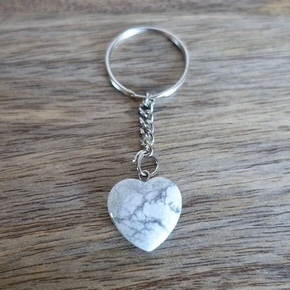 Howlite keychain. Shop at Magic Crystals for Crystal Keychain, Pet Collar Charm, Bag Accessory, natural stone, crystal on the go, keychain charm, gift for her and him. Howlite is a great for vitality. Howlite Natural Stone Keychain, Crystal Keychain, Howlite Crystal Key Holder. White gemstone.