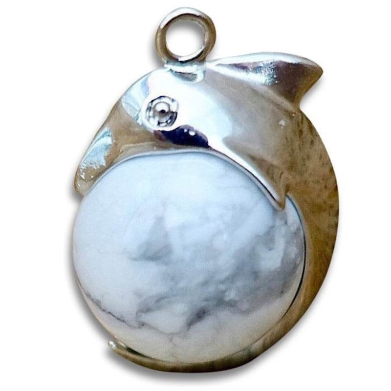 Howlite-Sphere-Dolphin-Pendant-Necklace. Dolphin Necklace - Elegant Ocean-Themed Jewelry for Women Dolphin Charm Necklace at Magic Crystals. Boho Style Jewelry with Natural Gemstones. Stone Carved Dolphin Necklace Pendant, Beach Surf Ocean Boho Gemstone Whale Fairtrade Gift. These beautiful stone necklaces are all hand carved.