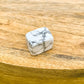 Looking for Howlite tumbled Stone? Shop at Magic Crystals for Howlite Polished stone, Howlite Stone, Crystal Stone at Magic Crystals. Natural Howlite at Magiccrystals.com offers the best quality gemstones.