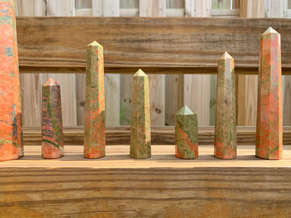 Looking for Unakite Stone Obelisk? Shop at Magic Crystals for Natural Unakite Towers, unalite carvings and more. These Unakite obelisks hold a power all their own as they symbolize the ancient obelisks found in Egypt. Shop Unakite obelisks, wands and pencil points. FREE SHIPPING available.