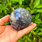Looking for Indigo Gabbro Sphere? Shop for Mystic Merlinite, Indigo Gabbro Sphere Stones, Pocket Stone, Natural, Polished at Magic crystals. Mystic Merlinite is one of the newest meditation tools we all should have with us. FREE SHIPPING available.    Indigo-Gabbro-Sphere-A