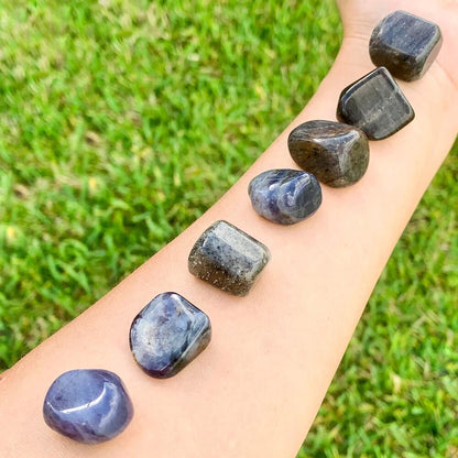 Buy Iolite Tumbled Stones, Iolite Polished Gemstone, Healing Stone, Bulk Crystals at Magic Crystals. Iolite is a motivational gemstone that helps you to organize your life path, achieve your goals and dreams through determination & focus, keeps you eager for success in life, and will help you to better manage your financial life. 