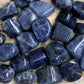 Buy Iolite Tumbled Stones, Iolite Polished Gemstone, Healing Stone, Bulk Crystals at Magic Crystals. Iolite is a motivational gemstone that helps you to organize your life path, achieve your goals and dreams through determination & focus, keeps you eager for success in life, and will help you to better manage your financial life. 