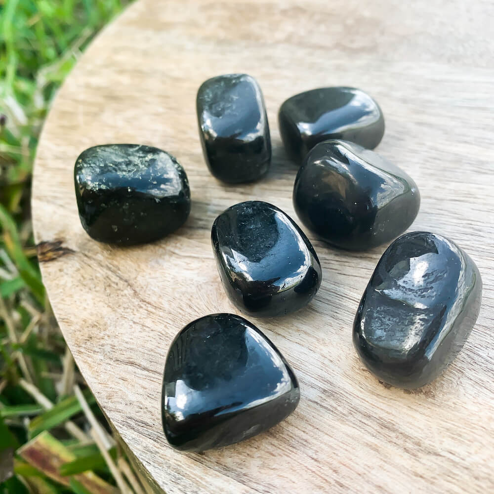 Buy Black Jet Tumbled Stones | Jet Polished Gemstones | Bulk Crystals. Jet is a protective warrior stone. It helps you get out of your head and back down to earth. Jet Tumbled Stone | Gemstone Healing, Chakra Stones, Protection Crystals, Wicca, Witchcraft Crystals, Collectable Stones, Pagan tools at Magic Crystals.