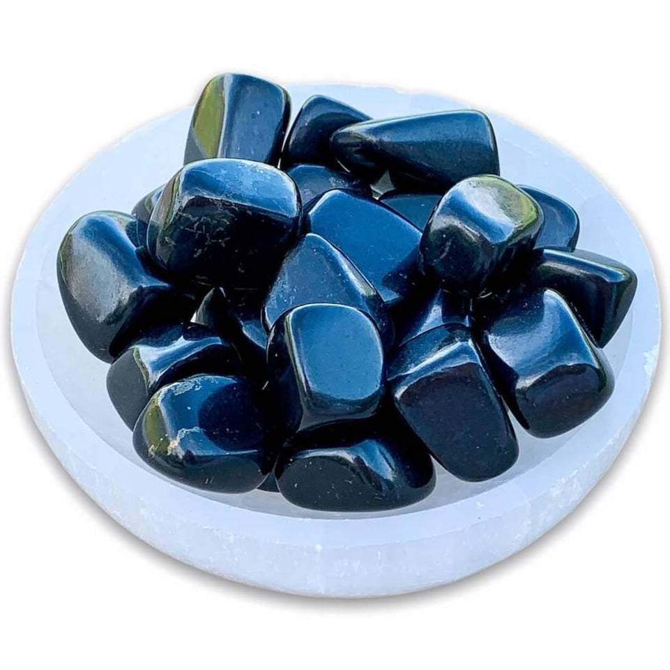 Buy Black Jet Tumbled Stones | Jet Polished Gemstones | Bulk Crystals. Jet is a protective warrior stone. It helps you get out of your head and back down to earth. Jet Tumbled Stone | Gemstone Healing, Chakra Stones, Protection Crystals, Wicca, Witchcraft Crystals, Collectable Stones, Pagan tools at Magic Crystals.